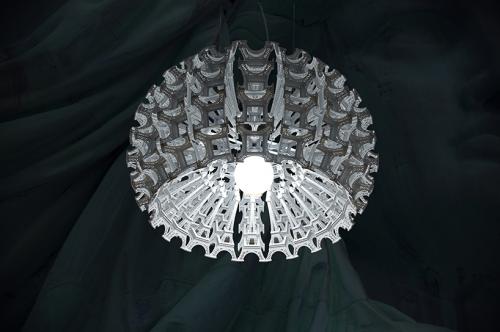 "COLOSSEUM" big suspended lamp, pays tribute to Eiffel.